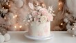 © Aditya - Elegant blush pink wedding cake adorned with delicate sugar flowers and feathers.  Set against a dreamy, blurred Christmas backdrop with soft lighting.
