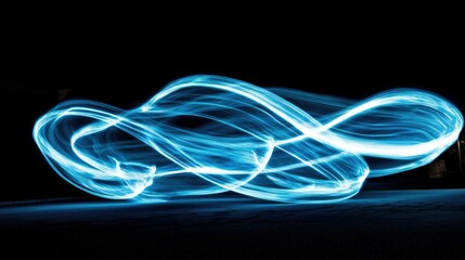 Wall Mural - A beautiful display of glowing light streaks swirling through the darkness, creating an ethereal dance of light.