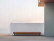© JuanM - Minimalist architectural bench against a simple wall in a serene outdoor setting