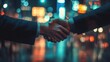© Johannes - Handshake with forex chart on blurry night city background. Close up. Teamwork and stock market concept. Double exposure.