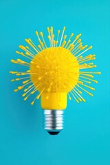 Poster - Bright yellow light bulb resembling a flower against a vibrant turquoise background, symbolizing creativity and innovation.