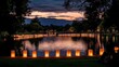 © Big9869 - Illuminated Lake at Sunset with Lanterns and Mountains