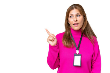 Wall Mural - Middle-aged caucasian woman with ID card over isolated background intending to realizes the solution while lifting a finger up