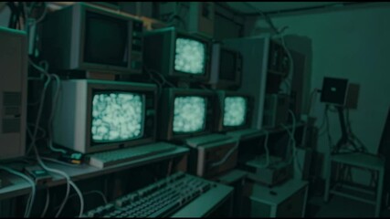 Poster - computer technician monitoring multiple vintage computer screens filled with static noise, working l