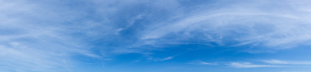 Wall Mural - Blue sky background with tiny clouds. Cloudscape - Blue sky and white clouds. Clouds with blue sky
