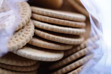 Poster - A close-up shot of assorted cookies in a paper bag, perfect for food photography or baking inspiration.