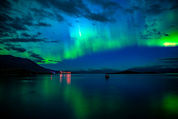 Wall Mural - northern lights dancing over lake torne trask . abisko national park in north of sweden.
