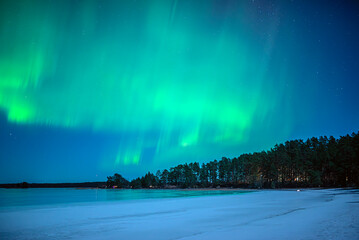 Wall Mural - northern lights dancing over lake. farnebofjarden national park.