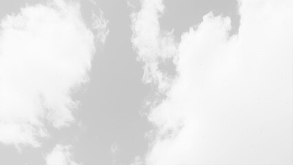 Wall Mural - Fluffy white clouds stretch across a seamless sky background. Background texture of fluffy white clouds. 