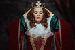 © Alliance - medieval queen in red dress with white collar and crown