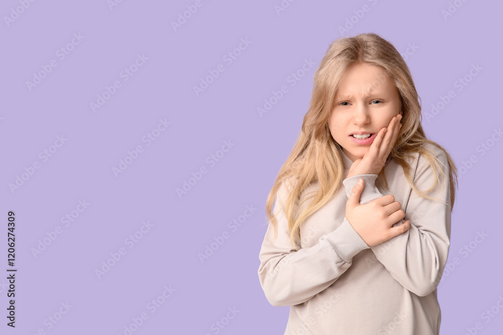 Young girl suffering from toothache on lilac background