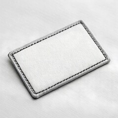 Poster - Blank rectangular fabric patch mockup with stitched border on white background, perfect for branding design.