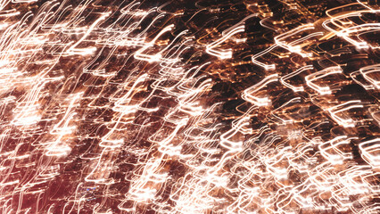 Poster - The image is a blurry, abstract representation of a cityscape at night. The streaks of light and the overall composition create a sense of movement and energy, evoking a feeling of excitement