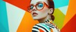 © Fernando - Stylish woman with orange retro glasses and colorful striped shirt posing against vibrant geometric background