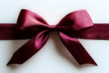 Wall Mural - Elegant Maroon Satin Bow on a Simple Background for Gift Wrapping