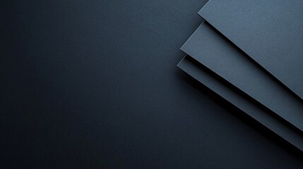 Poster - Overlapping dark gray shapes create a stylish and modern design on a textured background