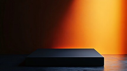 Poster - Black square platform illuminating orange wall in studio