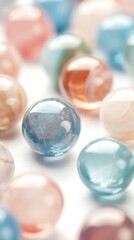Poster - The vibrant glass marbles display a variety of colors and patterns against a clean white background, creating a playful arrangement