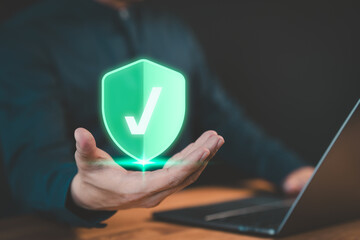 Fototapete - Man is showing on hand identity proofing icon for security protection system on virtual screen. Concept of Quality assurance of business service, Certified guarantee approval or secure access system.
