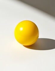 Leinwandbilder - Yellow sphere on white background with shadow.