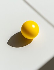 Aufkleber - Single yellow sphere casting shadow on white background.