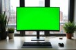© RESTY - Green Screen Monitor On Modern Office Desk With Plants