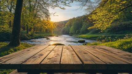 Poster - A wooden table set outdoors against a backdrop of beautiful spring scenery, with vibrant green trees, a flowing river, and a clear sky, offering a peaceful setting.