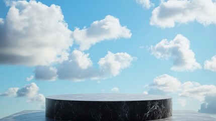Poster - Black stone podium in front of a bright sky-blue background with soft clouds. Ideal for product showcasing, presentations, or minimalist display concepts.