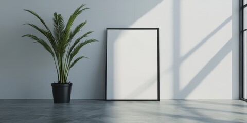 Poster - Minimalist interior with blank frame, potted plant, and sunlight.