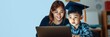 © Pimchada - Asian child sitting at home with a laptop, wearing a graduation cap, and engaging in online learning for success in programming education, distance learning, graduate cap, Asian