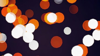 Poster - Bokeh lights in shades of orange and white on dark background, abstract photography. Artistic lighting concept