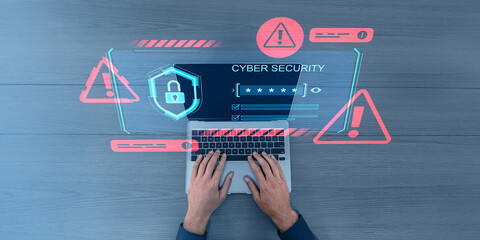 Poster - hands typing on laptop with cybersecurity symbols overlay.