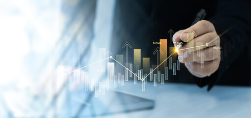 Wall Mural - Business growth graph chart. Businessman using tablet analyzing sales data and financial report.Financial marketing graph grow chart. Arrow up with graph corporate future growth plan.