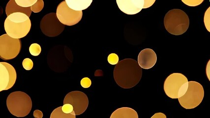 Aufkleber - Golden bokeh lights on black background, festive abstract pattern. Holiday celebration and atmospheric mood concept