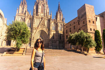 Wall Mural - Tourist admiring the barcelona cathedral in catalonia, spain