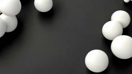 Poster - bunch of white balls are scattered on a black background. the balls are of different sizes and are a