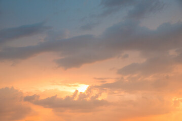 Wall Mural - dreamy sunset in soft pastel colors, orange and yellow