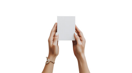 Poster - A pair of female hands delicately hold a blank white rectangular card against a black background providing a clean mockup for various applications.