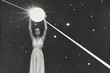 © Rytis - A black and white image of a woman reaching up to a bright celestial body or white beam among stars. Image contains noise and motion blur. Elements of this image furnished by NASA