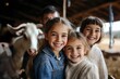 © Bojan - Children joyfully interacting with farm animals during a visit to a petting zoo