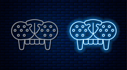Fototapete - Glowing neon line Cat tooth icon isolated on brick wall background. Vector