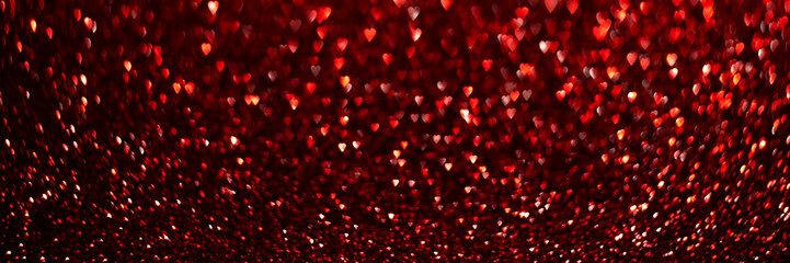 Wall Mural - Red hearts, sparkling glitter bokeh background banner, valentines day abstract defocused texture header