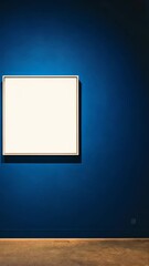 Wall Mural - empty canvas illuminated against a vibrant blue wall creates a bold artistic statement