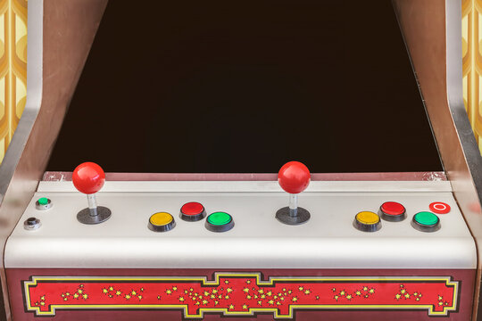 Vintage seventies arcade video game with black screen and copy space