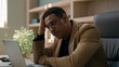 © Yuliia - Upset stressed African American man negative emotion fail business project with laptop desperate businessman office worker investor take off glasses work crisis bankruptcy worry failure loss finance