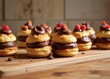 © ศุภารักษ์ วงค์อินทร์ - Chocolate cream-filled choux pastry stacks on a wooden surface , indulgent, pastry, dessert