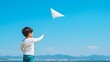 © pkproject - Carefree Child Flying Kite Under Clear Blue Sky On Sunny Day