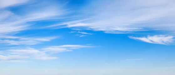 Wall Mural - vast blue sky with wispy cloud trails, dreamy atmosphere