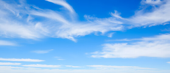 Wall Mural - clear sky with layers of clouds, soft contrast