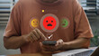 © IDOL'foto - User Providing Poor Feedback on Mobile Device. One Star Rating with Red Unhappy Icon Depicting Negative Customer Experience, Service Criticism, and Consumer Frustration